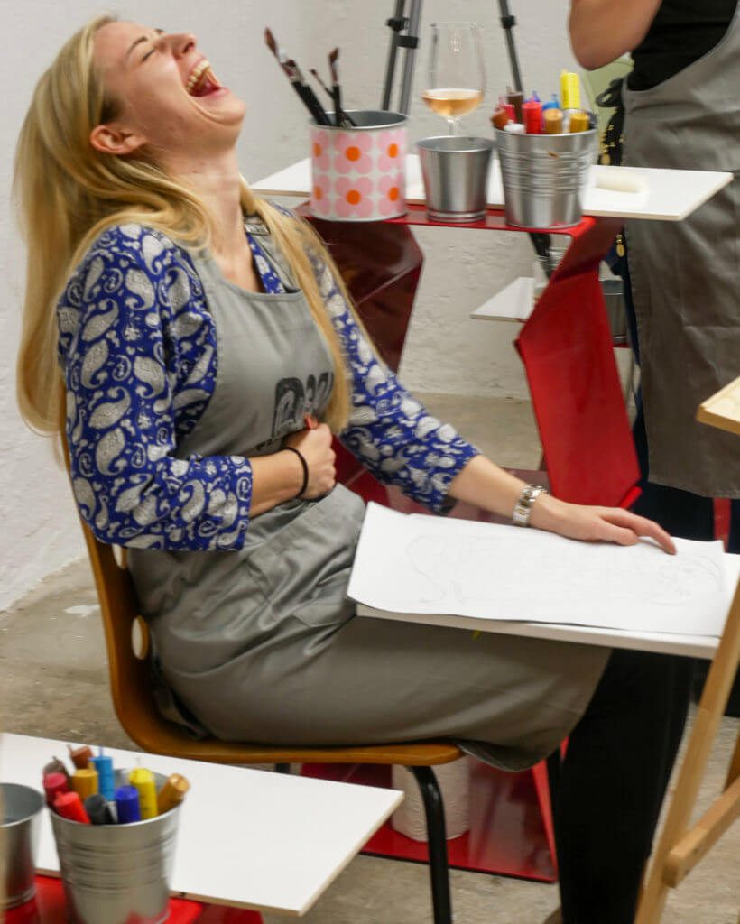 girl having fun on a painting workshop